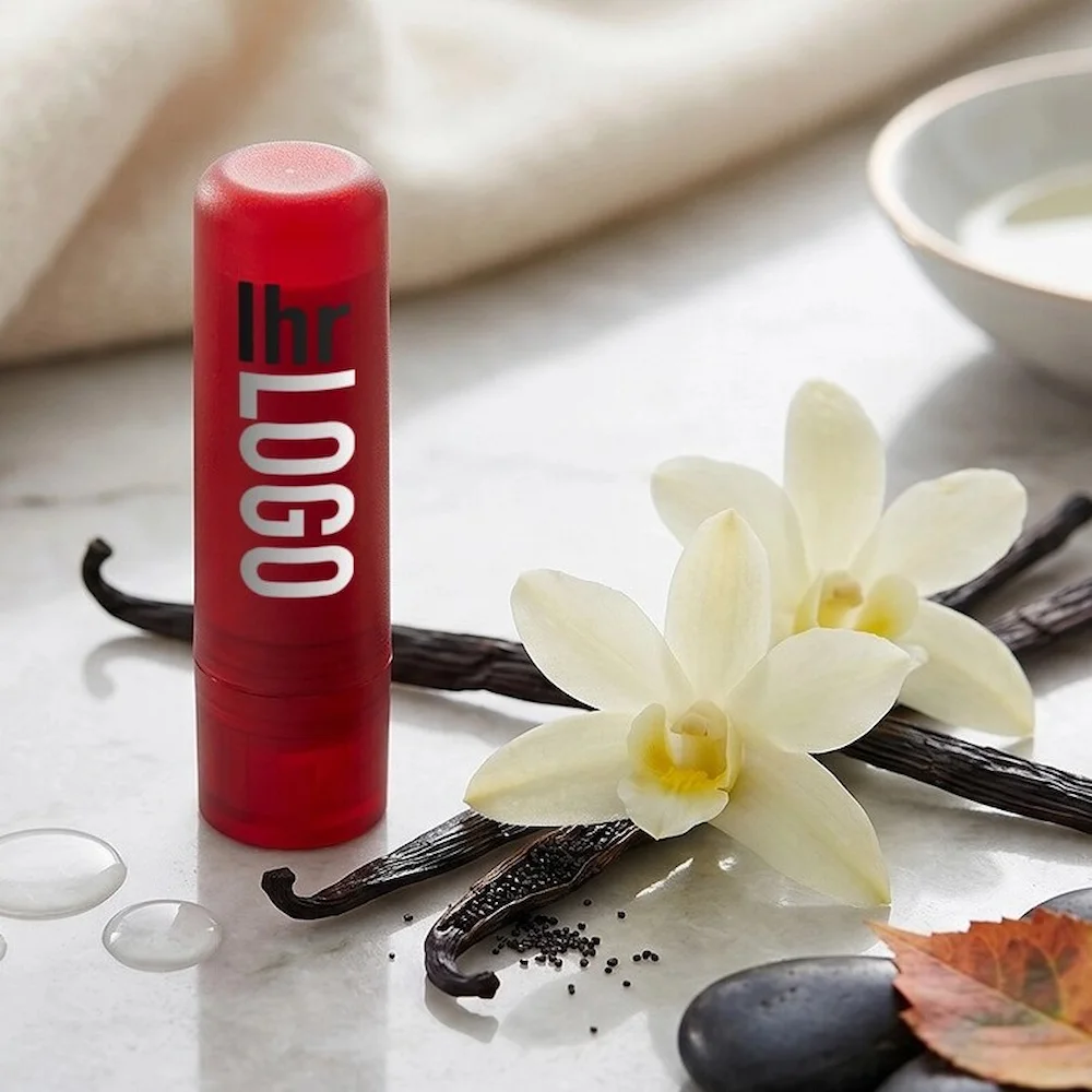 Deale Lippenpflegestift Deale Lippenpflegestift in Rot neben Blumen – attraktiver Werbeartikel für Events, Promotion und Markenpräsenz