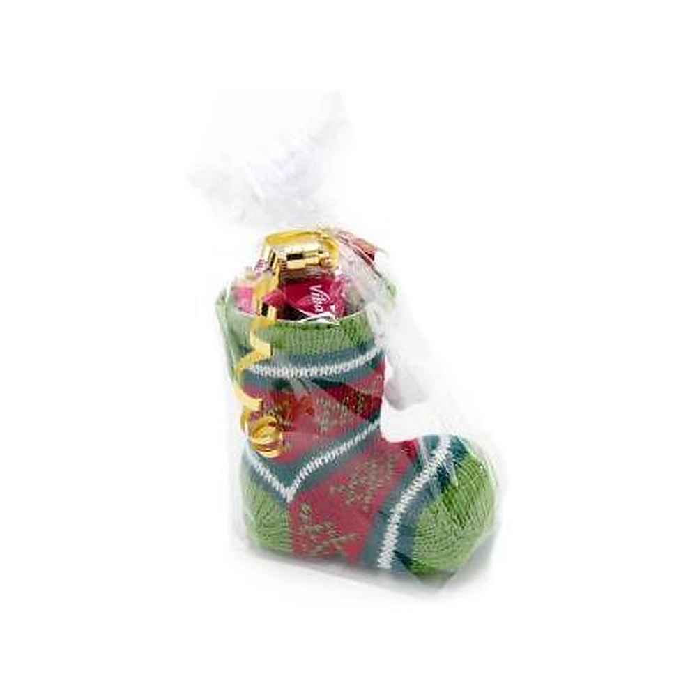 Nikolausstiefel mit Nougat und weihnachtlichen Süßigkeiten, festlich verpacktes Weihnachtsgeschenk als Werbeartikel für Kunden, Mitarbeiter und Geschäftspartner.