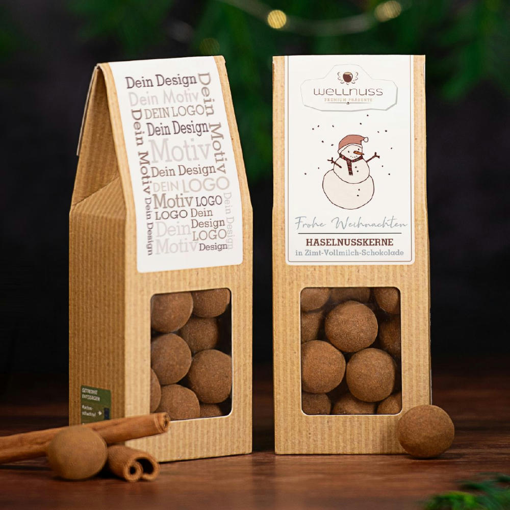 Product image Haselnusskerne in belgischer Vollmilch-Zimt Schokolade in FSC® zertifizierter Faltschachtel mit individuell bedrucktem 4c Etikett als B2B Werbeartikel zu Weihnachten