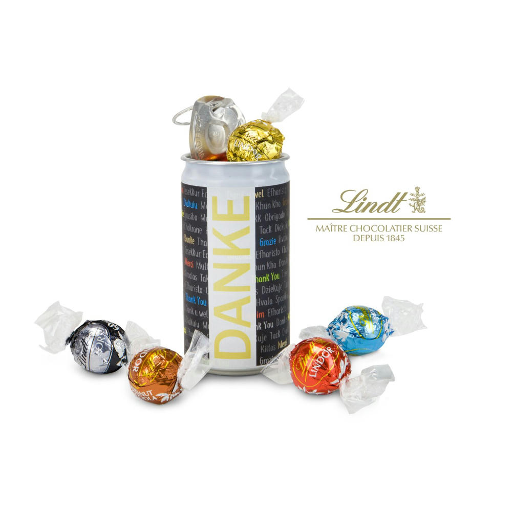 Geschenkartikel / Präsentartikel: Lindt-Geheimnis Ostern, das Nest in der Dose - Etikett Frohe Ostern - EierWiese Werbeartikel