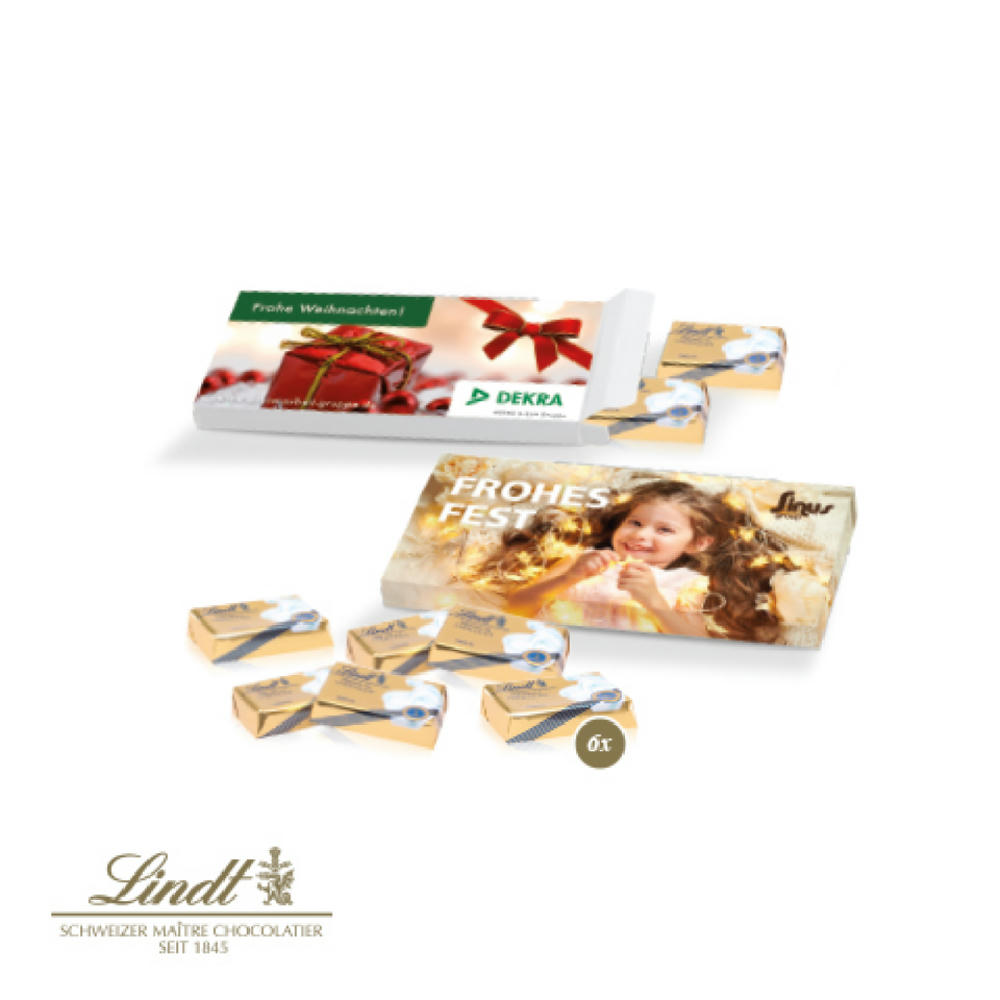 Präsentbox gefüllt mit 6 Lindt Vollmilch Schokotäfelchen in individuell bedruckbarer FSC® Werbekartonage als B2B Weihnachts-Giveaway